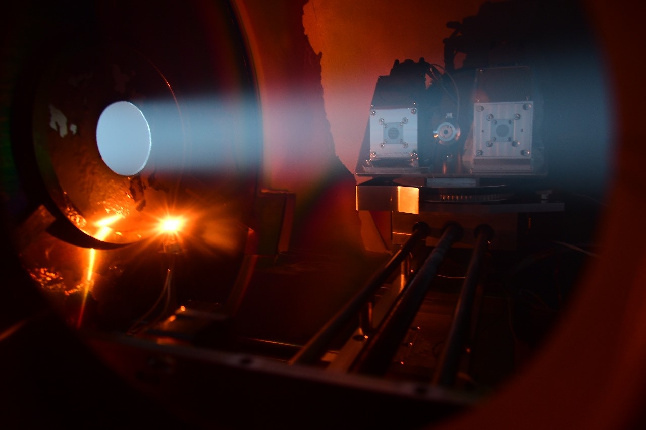 In this photo, the ion beam of the engine is simulated to check the plasma sensor functionality. Image by Christian-Albrechts-Universität zu Kiel